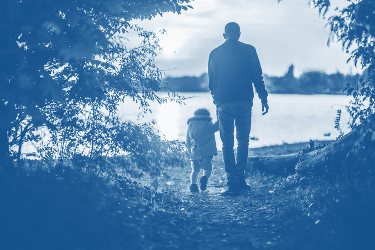 grandparent walking with child
